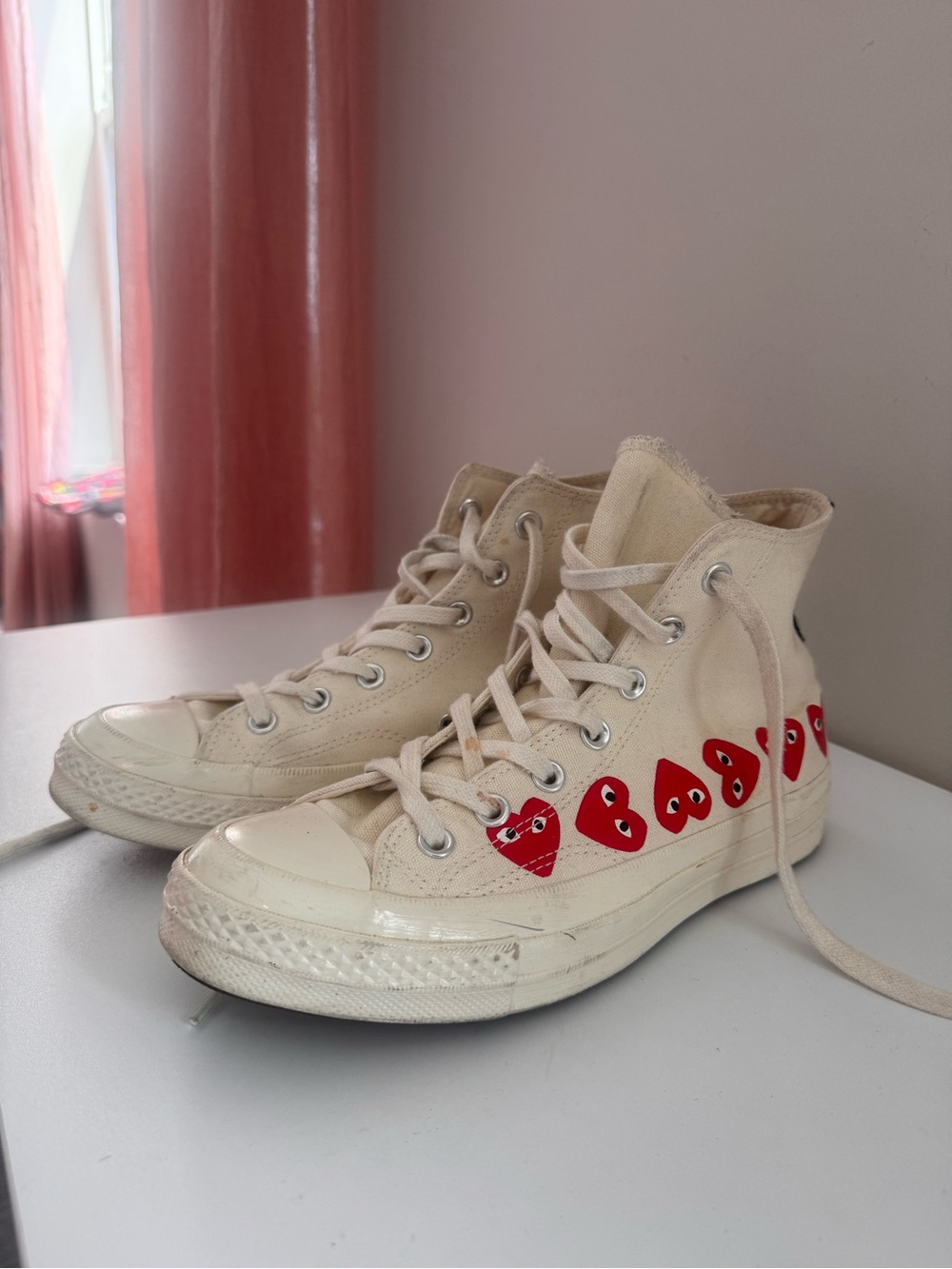 Converse Cream High-Top Sneakers with Red Heart Motif